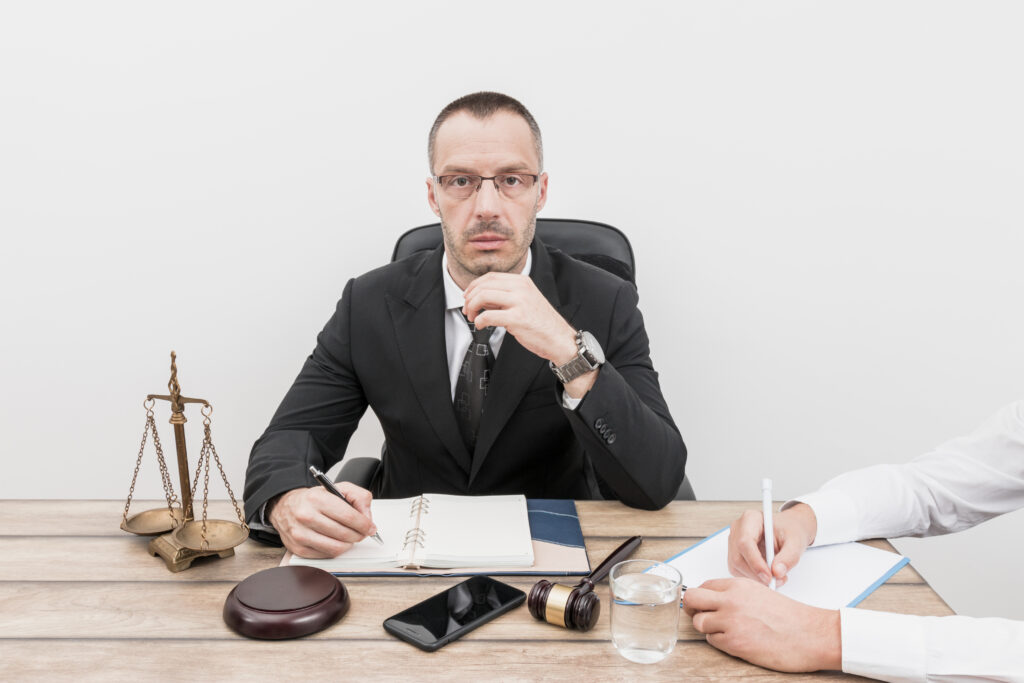 if you’ve been charged with a, lawyer with client